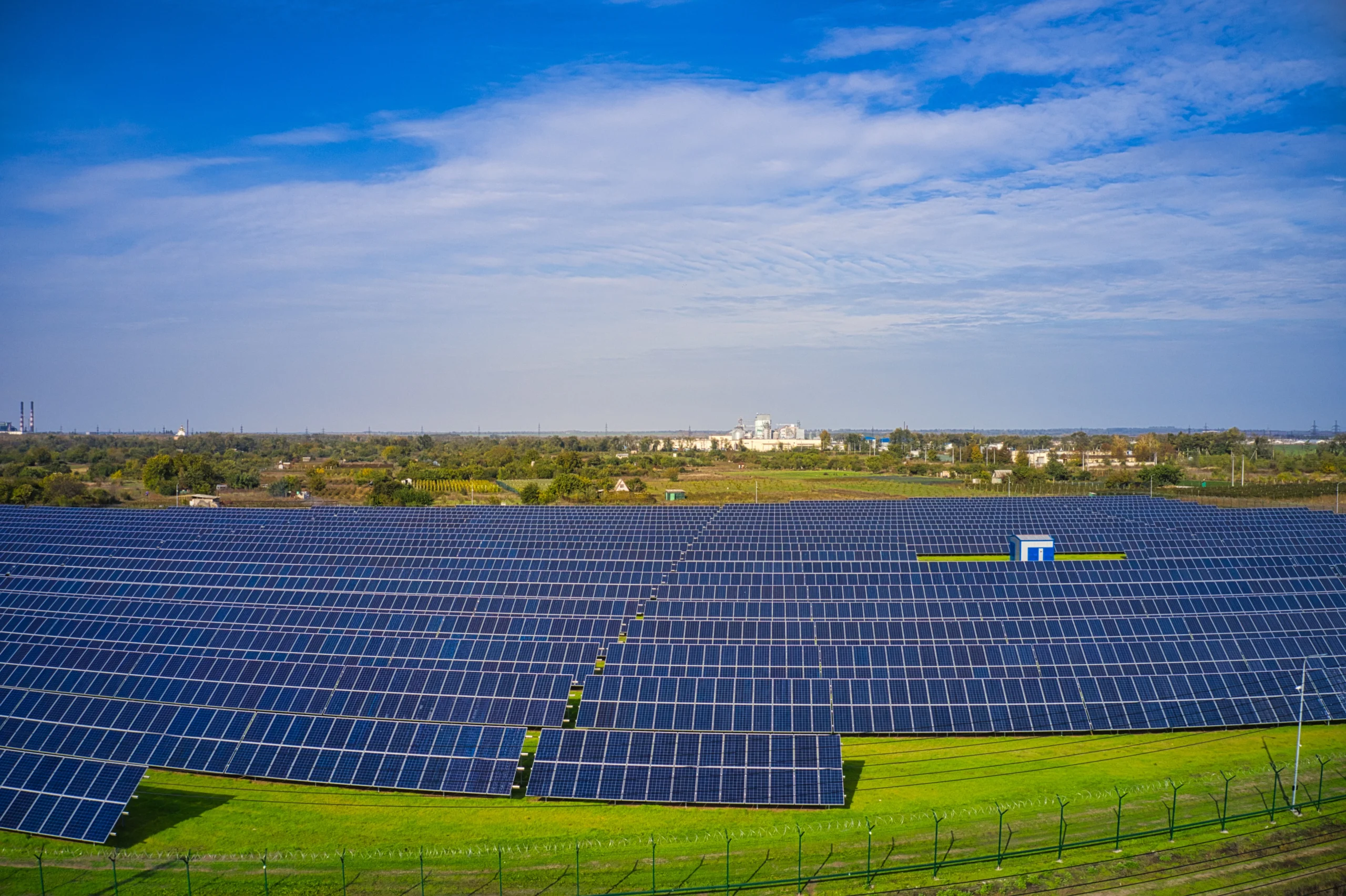 huge-solar-power-plant-use-solar-energy-picturesque-green-field-ukraine-aerial-view